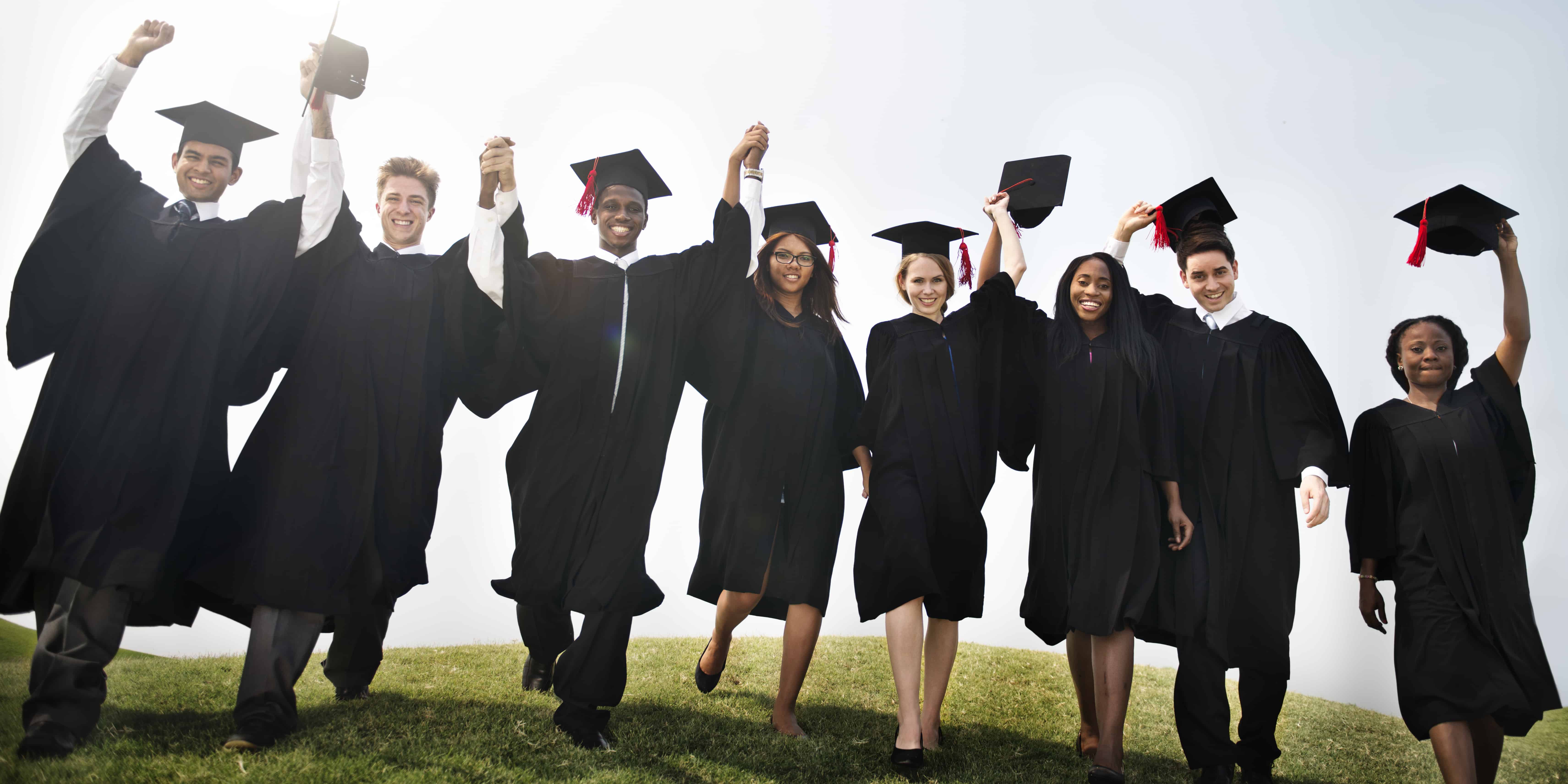 Group Students Hands Raised Graduation Concept